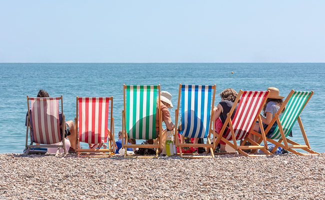 Family on Deckchairs at the Beach